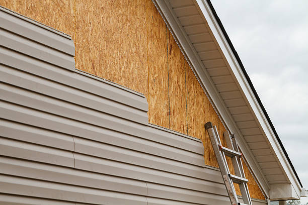 Professional Storm Damage Siding Repair technician working in Newton, NC